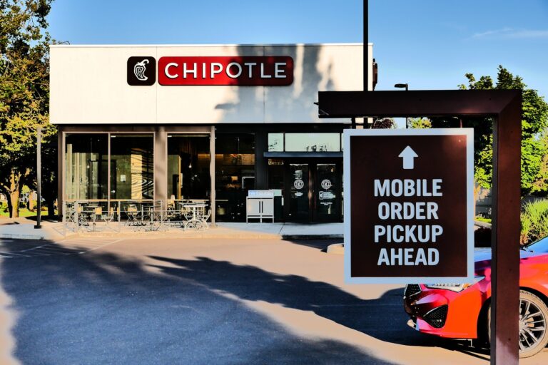 Chipotle restaurant with a mobile order pickup sign in Albany, Oregon