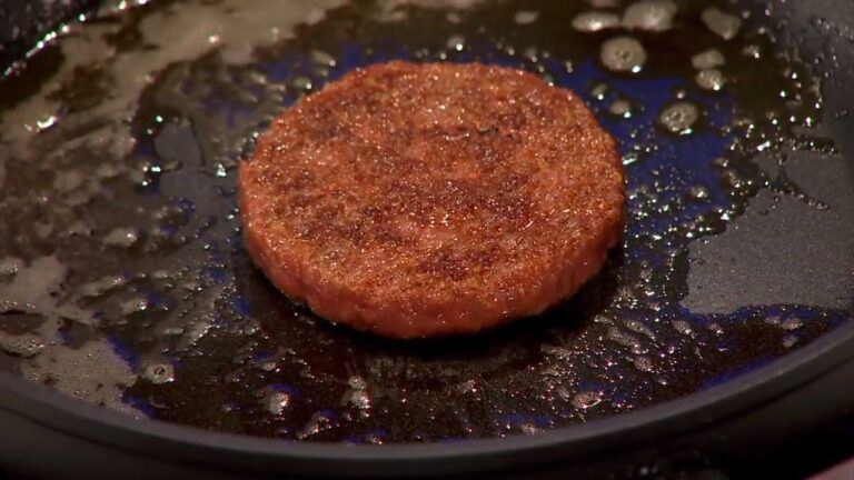 The world's first cultured beef hamburger being fried at its 2013 London press presentation