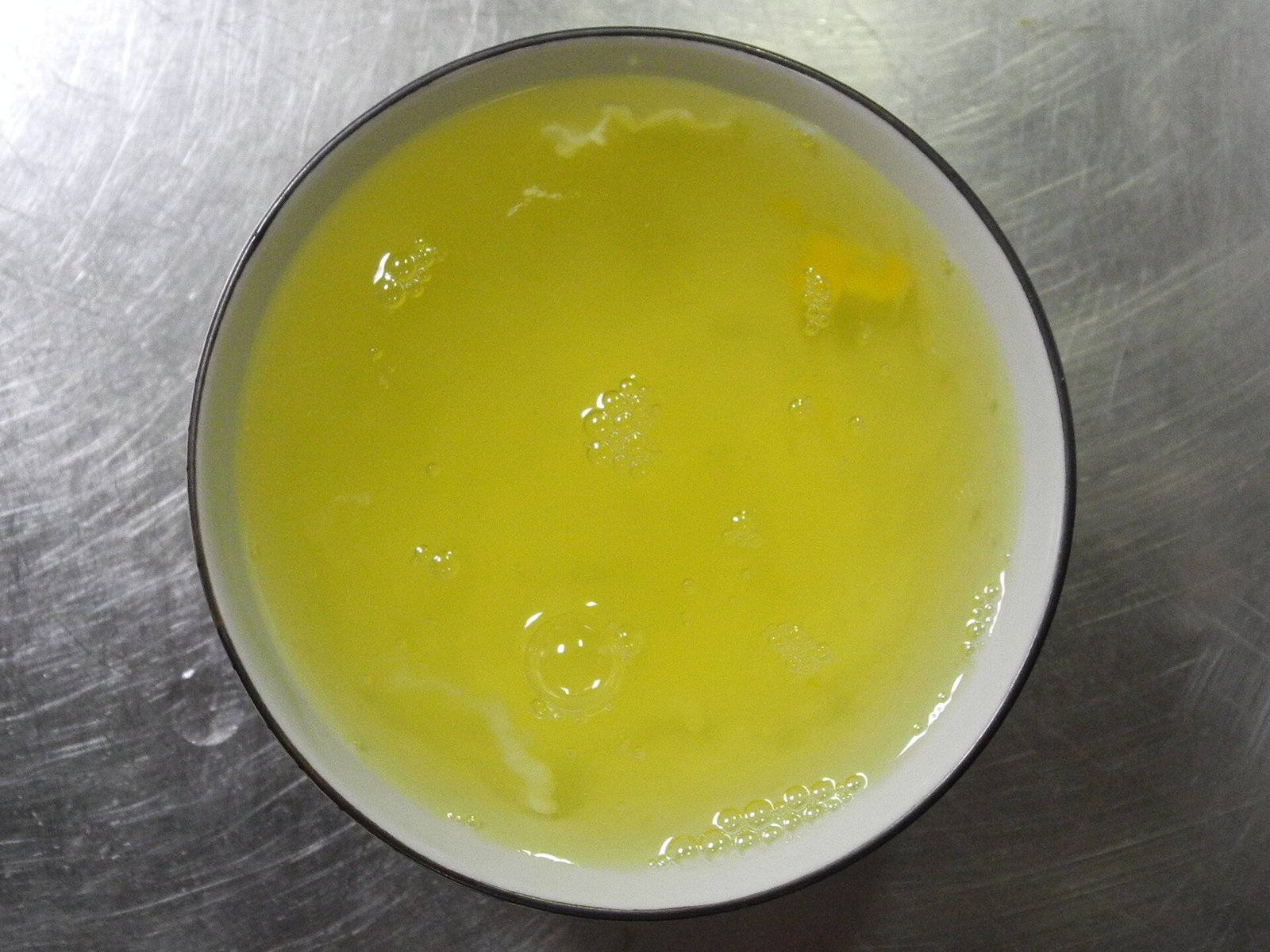 Bowl of liquid egg whites, the ingredient precision-fermented ovalbumin is designed to replace