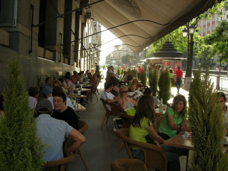 Diners seated on the outdoor terrace of the Círculo de Bellas Artes café in Madrid