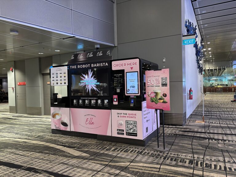Automated robot barista kiosk preparing drinks at Singapore Changi Airport Terminal 3