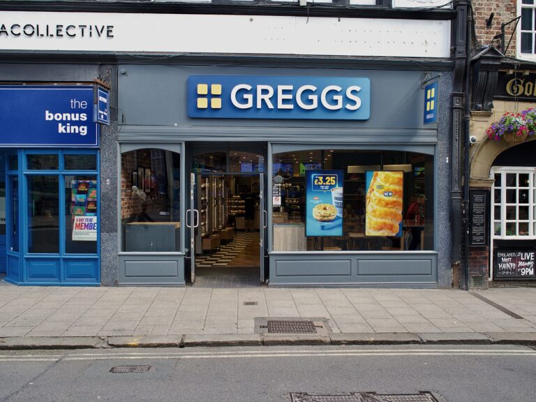 Exterior of a Greggs bakery shop on Pavement in York, England