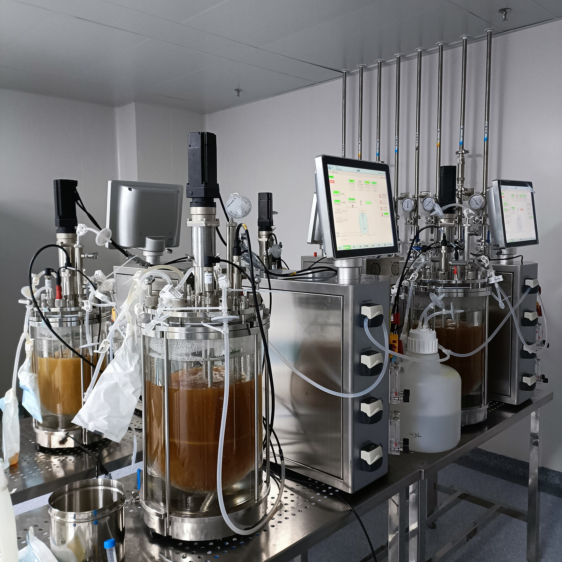 Bench-scale stirred-tank bioreactors used for cell culture in a laboratory