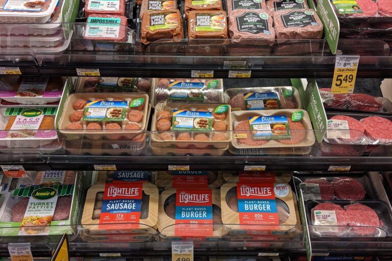 Plant-based meat products in the meat section of a supermarket
